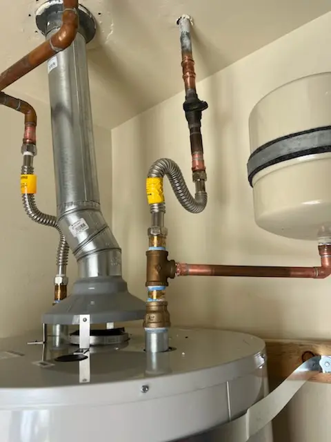Water heater installation and plumbing repair in Frog